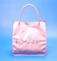 pink plastic cosmetic button bag with piping handle